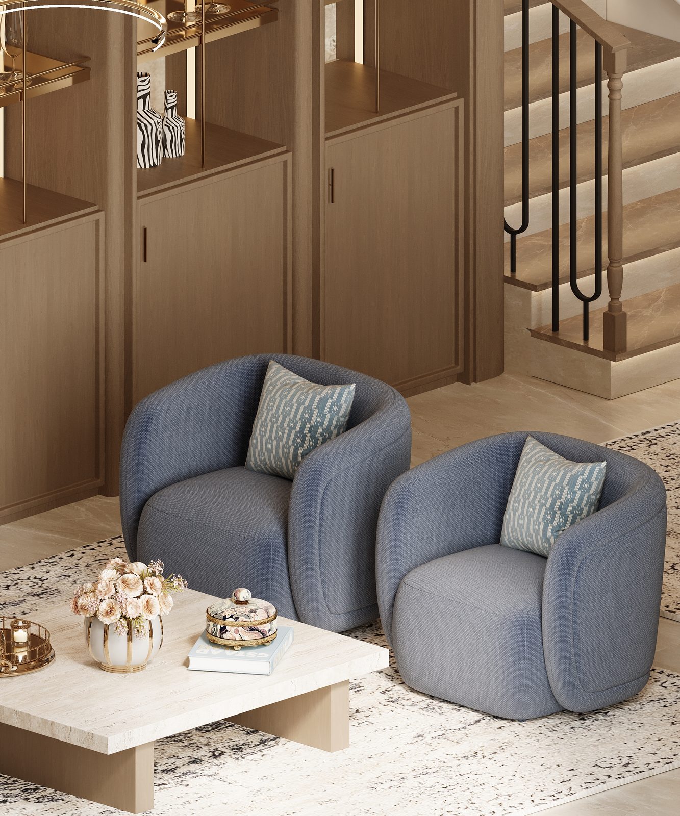 Navy boucle armchairs with a marble coffee table — family living detail, Riyadh villa
