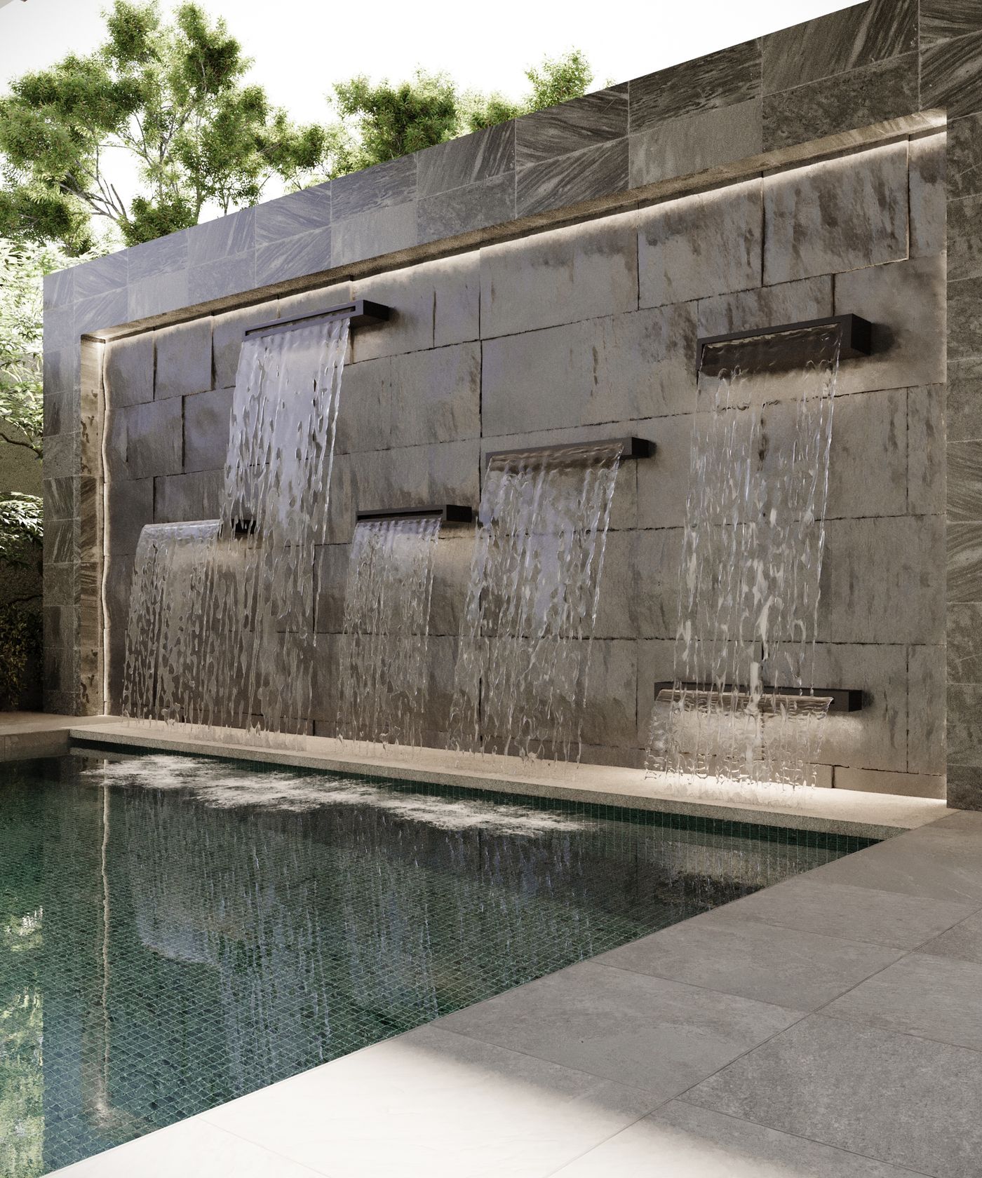 Water feature spouts along the pool edge