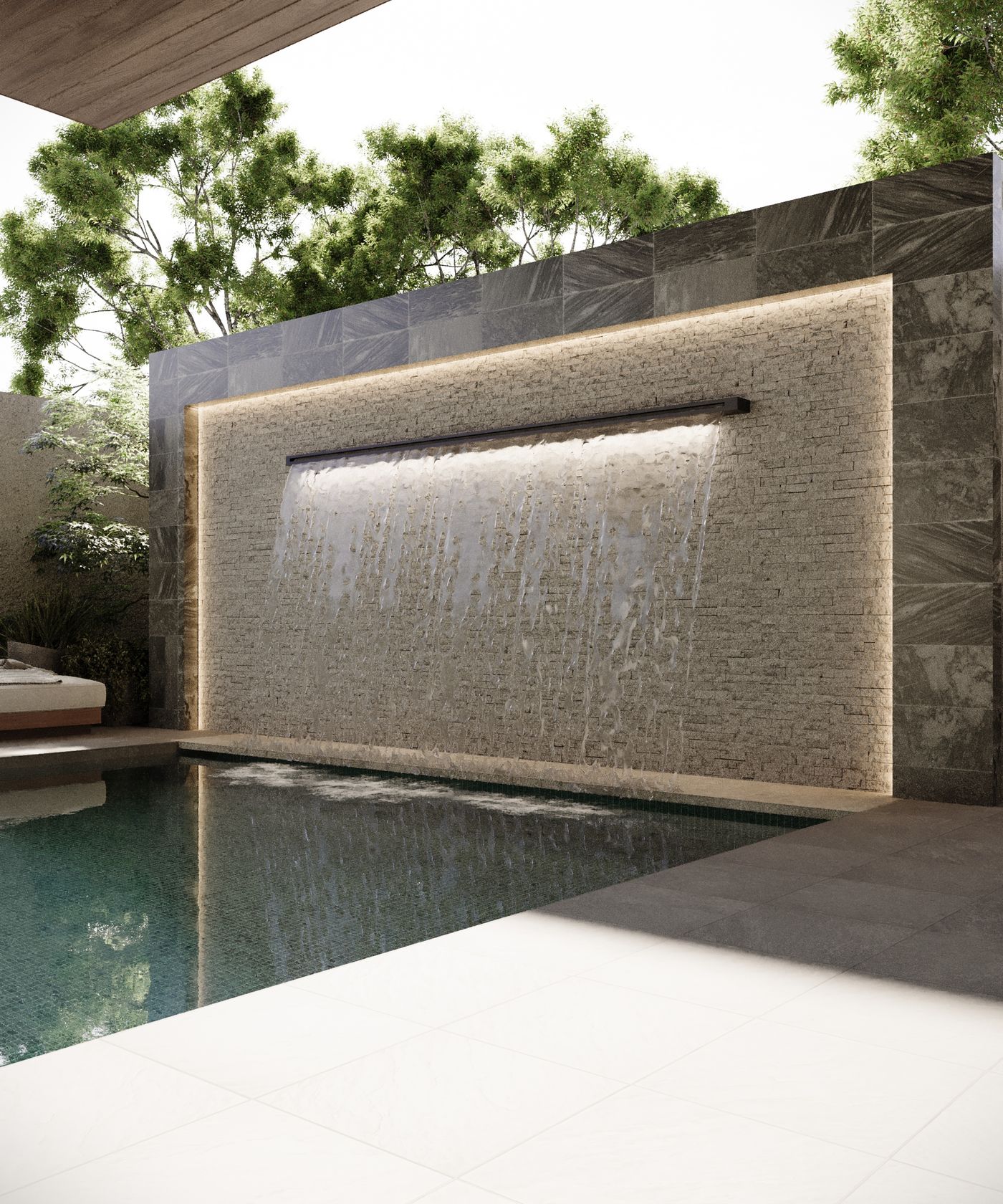 Illuminated water wall in the evening