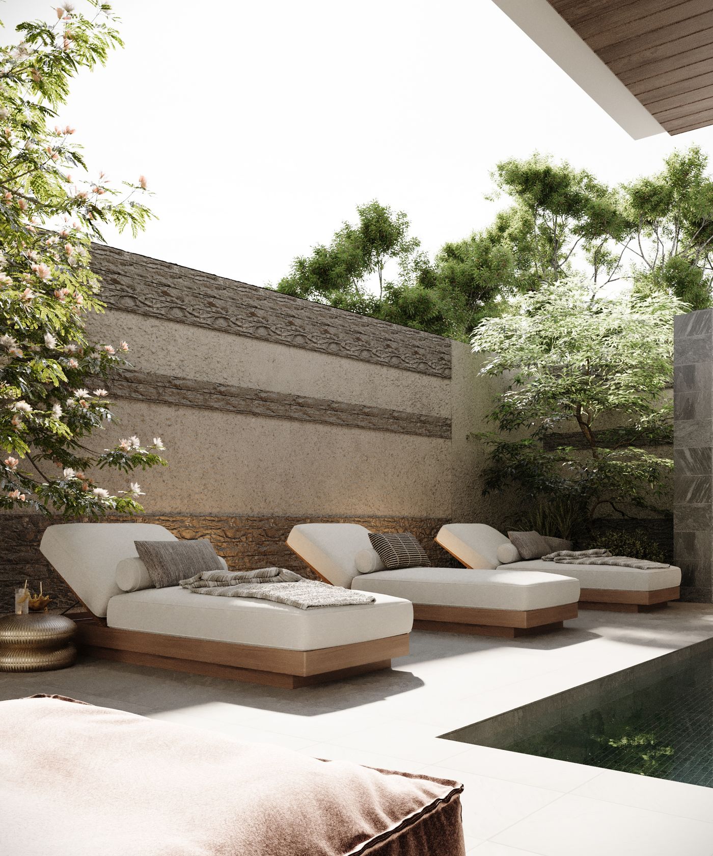 Courtyard sun loungers beside the pool